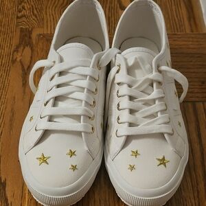 White Sneakers with Gold Star Accents